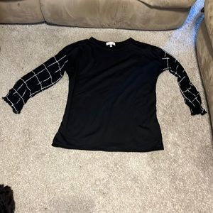 Black 3/4 shirt with plaid sleeves
